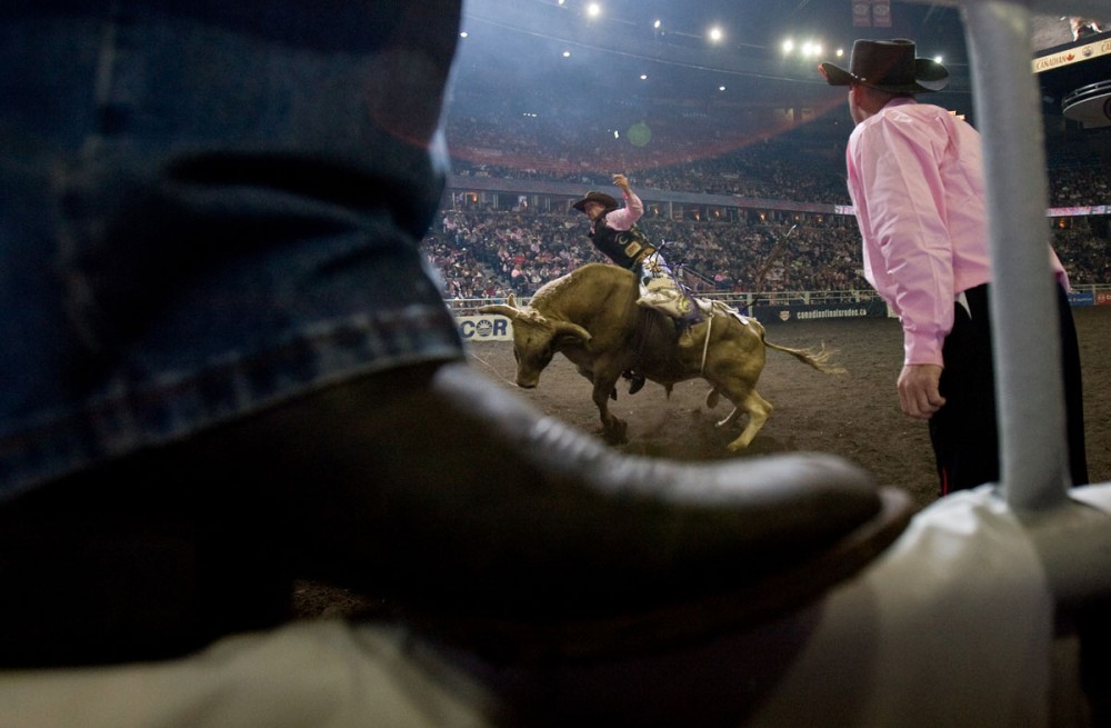 Garth Oldfield competes in the bull riding event at the Canadian Finals Rodeo at Rexall Place in Edmonton, AB on November 6, 2008.