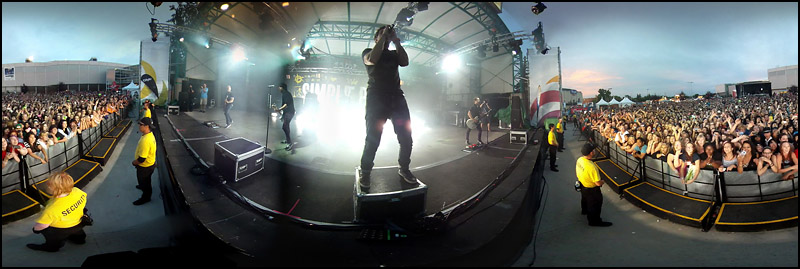 Simple Plan performs on the Telus Stage at Capital Ex on July 28, 2012. This image was created by stitching multiple pictures together. The Journal's Ryan Jackson has created a fun "choose your own adventure" style 360-degree panoramic tour of Capital Ex including 360-degree videos on a roller coaster and several other rides. You can eat corn dogs, play games and watch the fireworks.  The game is especially neat on a gyro-enabled iPad2 or iPhone 4.  Go to http://www.edmontonjournal.com/capex360    (Ryan Jackson / Edmonton Journal)