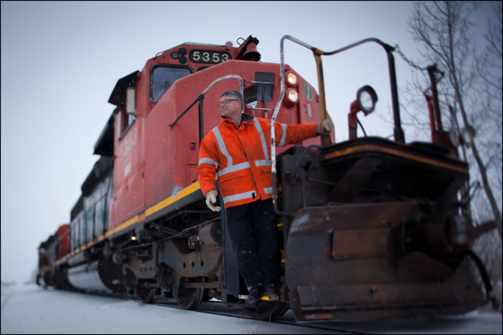Will Munsey, volunteer Engineer for the Battle River Railway, poses for a photo in Forestburg, Alta. on December 1, 2012.  The BRR is a community-owned railway line between Camrose and Alliance, Alta. The new generation co-op purchased the 80-km short-line from CN in 2008 after they announced they were going to sell off the rails for scrap. By keeping the line active, local area farmers are able to save money and time transporting their grain. The co-op also turns a profit which it returns to it's shareholders and plans to offer tourism and oil transport in the future.  [Note: Munsey is also the president of the Alberta Party. That is unrelated to the story]  (Ryan Jackson / Edmonton Journal)