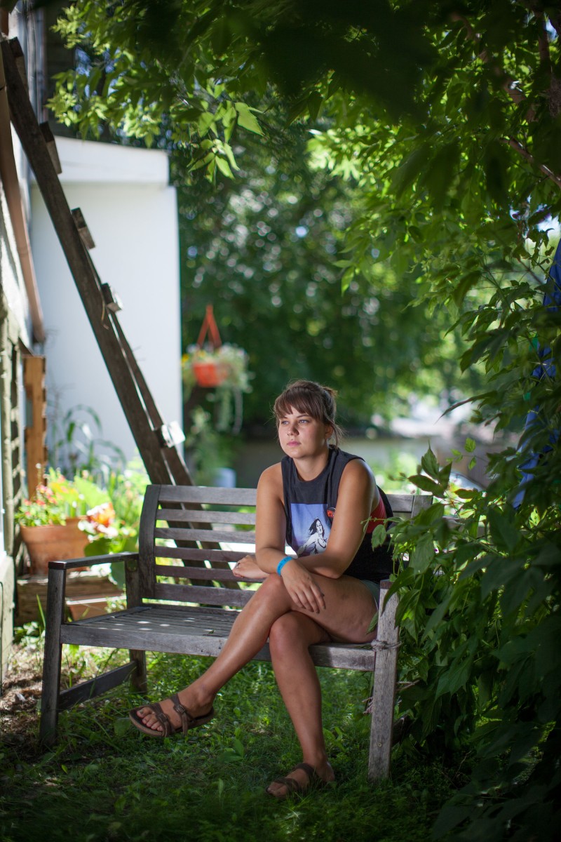 Melanie Lintott lost her partner Louise Veillard to suicide off the High Level Bridge on May 2, 2014. Lintott poses for a photo at her home in Edmonton on July 30, 2014. The High Level Bridge is considered by some to be a magnet for suicide in Edmonton and the city is investigating measures to reduce the number of people who jump to their deaths. (Photo by Ryan Jackson / Edmonton Journal)