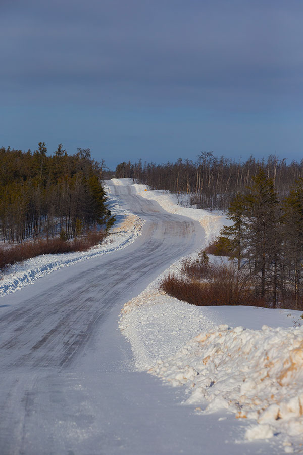 he winter ice road from Fort McMurray to Fort Chipewyan in Northern Alberta on on February 4, 2015. The 200-km temporary road typically opens mid-December and closes mid-March depending on the weather. During that short window of time all the construction materials, heating oil, gasoline and diesel fuel for the year is shipped up to the isolated community of Fort Chipewyan which can only be accessed by air or river barge in the summer. Photo by Ryan Jackson / Edmonton Journal
