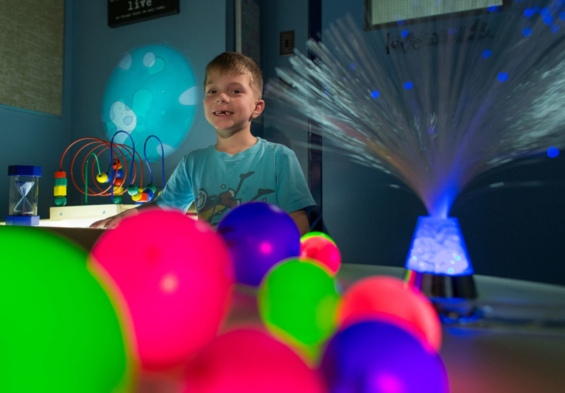 Grade 1 student Theodore Janz, 6, poses for a photo in the sensory calming room at Our Lady of the Prairies Elementary School in Edmonton on January 8, 2016. The room allows some students time to decompress, from the noise and buzz of an ordinary classroom. (Photo by Ryan Jackson / Edmonton Journal)