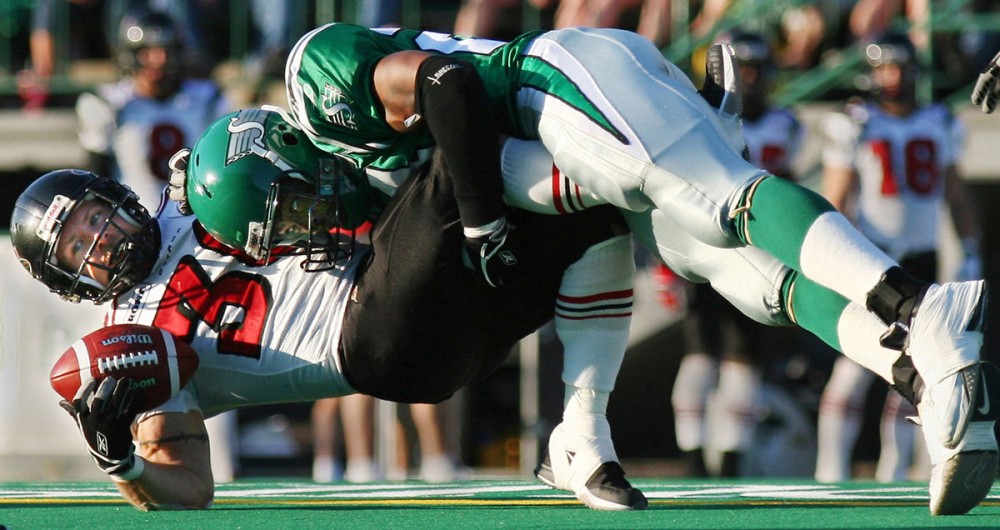 Reggie Hunt of the Saskatchewan Rough Riders takes down Josh Ranek of the Ottawa Renegades in the hardest hit of the game. Unfortunately Ottawa hit back with a 21-16 win. 2005.