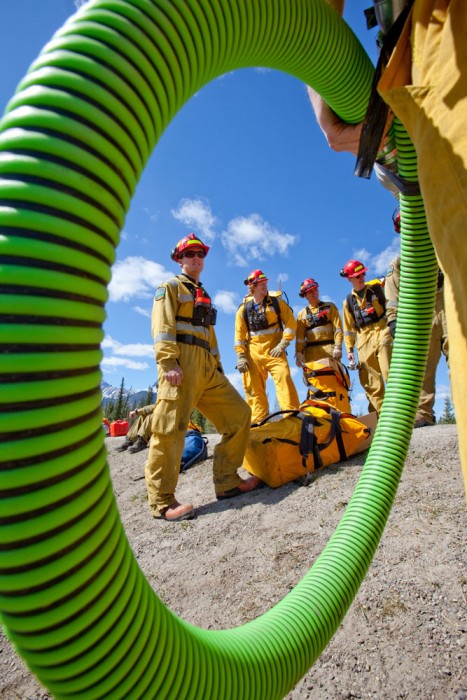 Students wait to start their pump and hose exercises during wildland firefighting training at the Hinton Training Centre run by Alberta Sustainable Resource Development in Hinton, Alta. on April 23, 2010.